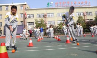 冰雪運(yùn)動(dòng)進(jìn)校園 “奧運(yùn)火炬”傳進(jìn)北京中小學(xué)校園